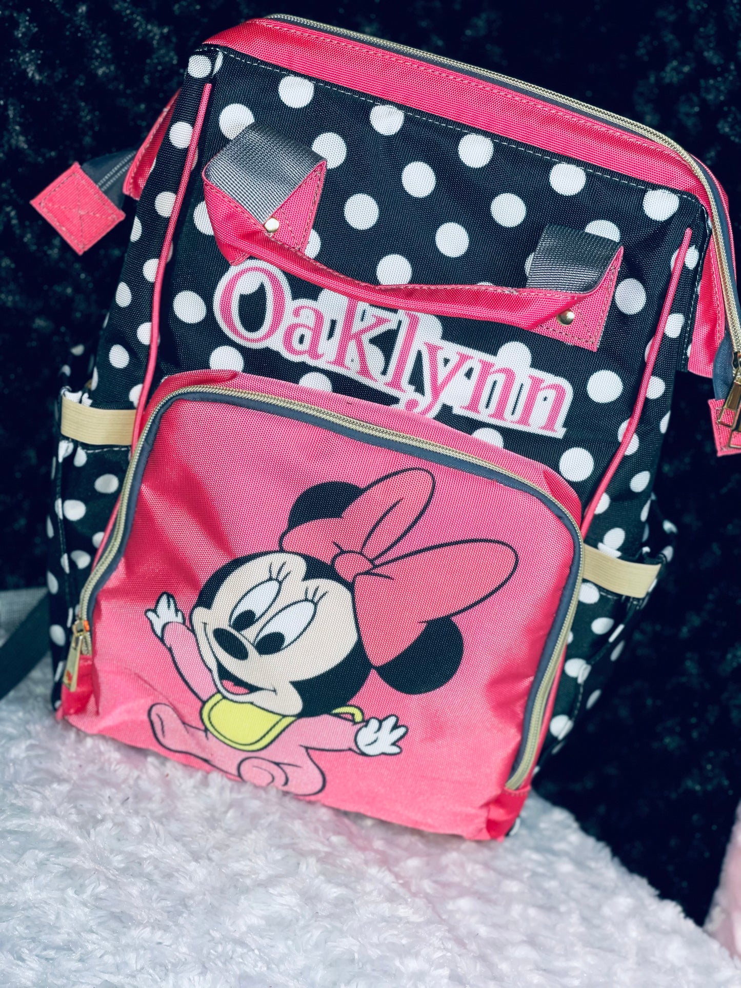 Pink and black polka dot bag