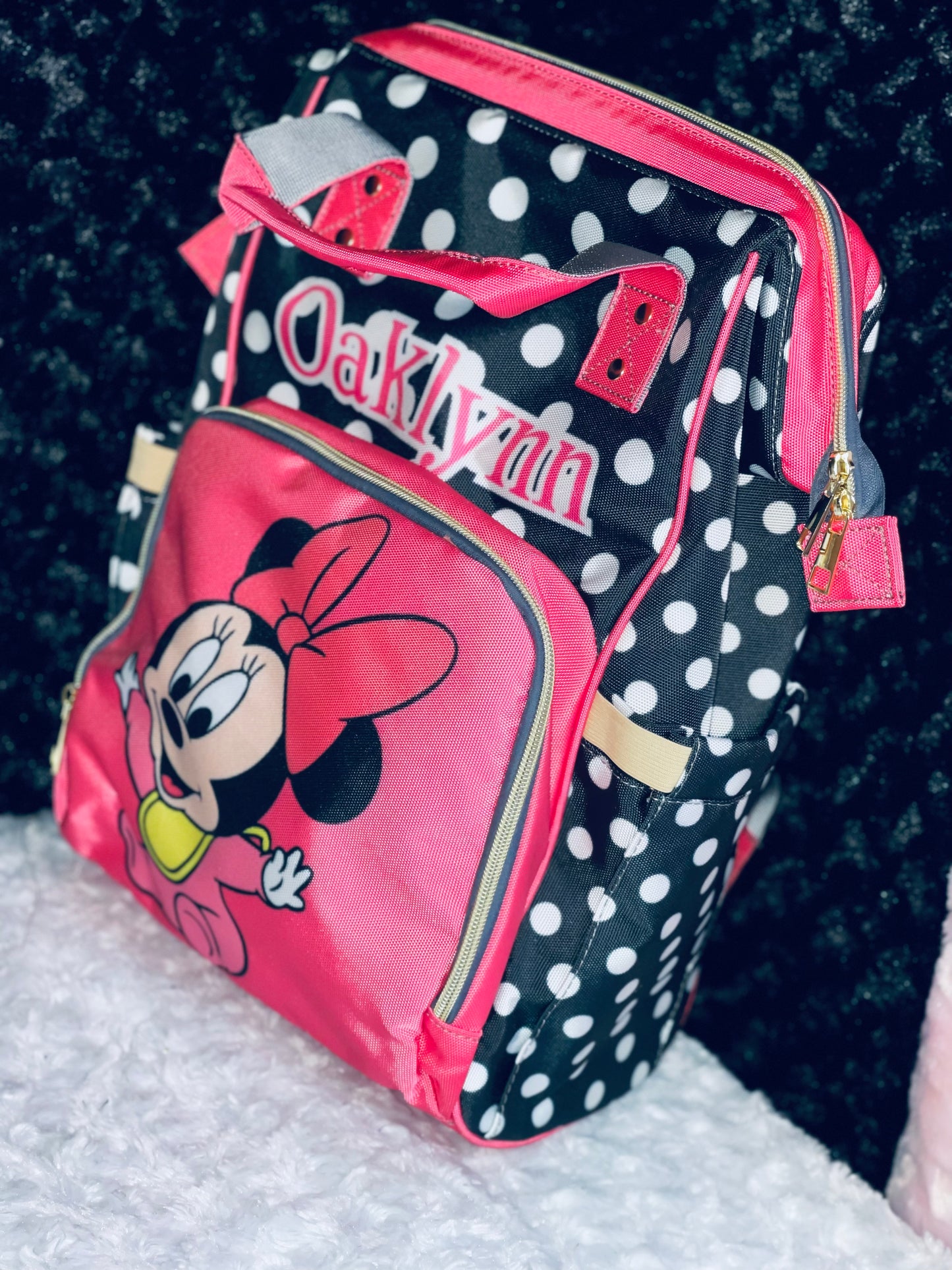 Pink and black polka dot bag